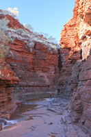 _and towering cliffs above